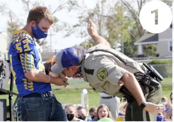 Officer Kissing Pig