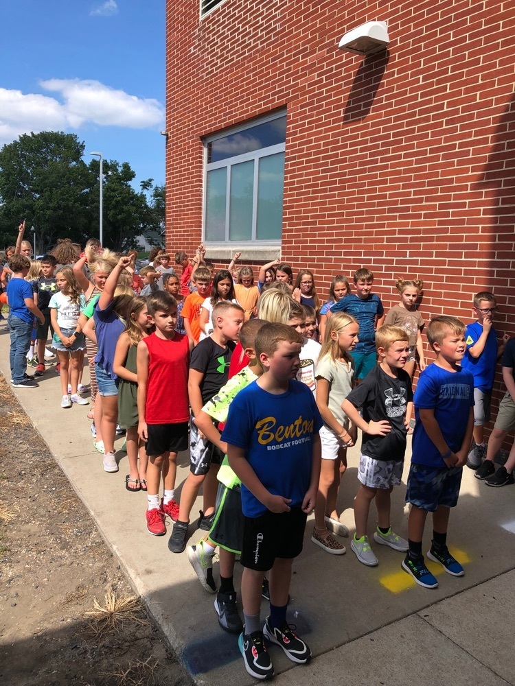 Third graders showing safe choices while standing still in line. 